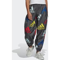 Adidas Essentials Multi-colored Logo Loose Fit Woven Pants