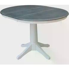 Round stone top dining table International Concepts - Dining Table 48x36"