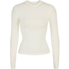 https://www.klarna.com/sac/product/232x232/3006782674/SKIMS-Cotton-Jersey-Long-Sleeve-T-shirt.jpg?ph=true