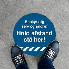 Gulvskilt "Hold afstand stå her" gulvfolie