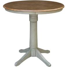 Round stone top dining table International Concepts 36 Round Top Pedestal Dining Table