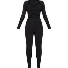 PrettyLittleThing Rib Cross Over Long Sleeve Jumpsuit - Black