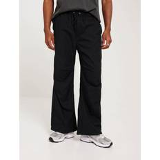 Jack & Jones Jogginghose JPSTPARACHUTE JJPANT schwarz