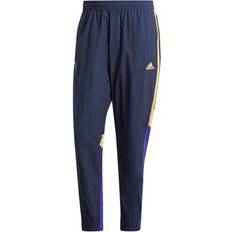 Real Madrid Pants & Shorts Adidas Men's Navy Real Madrid 2023/24 Urban Purist Woven Track Pants