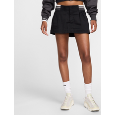L Skirts Nike Women's Sportswear Low-Rise Canvas Mini Skirt in Black, FN2237-010