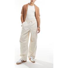 Dickies Men - White Pants & Shorts Dickies Fisherville Cremehvide faldskærmsbukser
