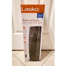 Radiators Lasko ceramic tower heater with remote