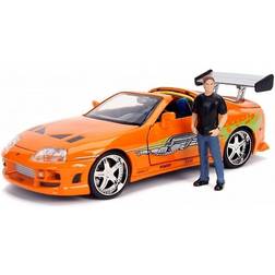 Jada Toyota Supra Orange Metallic with Brian Diecast Figurine "Fast & Furious" Movie 1/24 Diecast Model Car