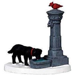 Fountain with a Puppy taking a drink