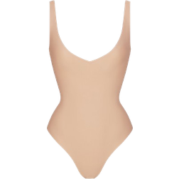 SKIMS Body Unlined Plunge Thong Bodysuit - Clay