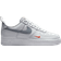 Nike Air Force 1 '07 M - Photon Dust/Safety Orange/White/Cool Grey